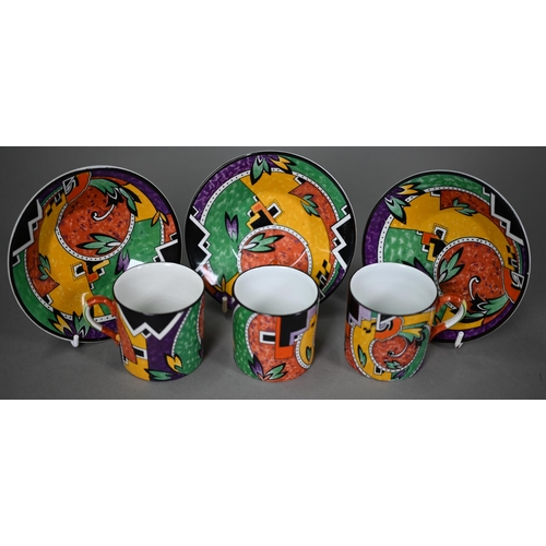 641 - An Art Deco pottery coffee service printed with polychrome abstract designs, comprising coffee pot, ... 