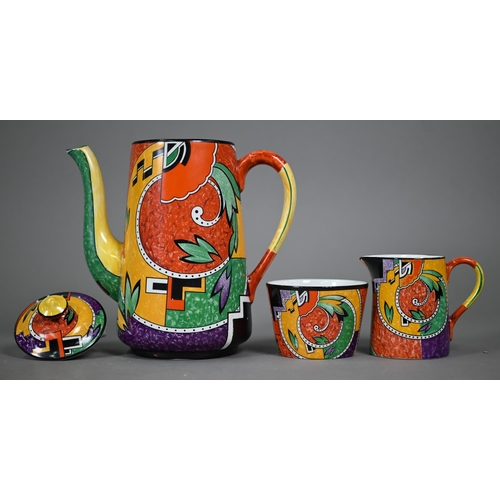 641 - An Art Deco pottery coffee service printed with polychrome abstract designs, comprising coffee pot, ... 