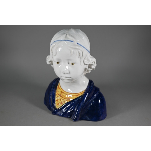 642 - An Angelo Minghetti & Son (Bologna, Italy) majolica bust of a Renaissance boy, 31 cm high