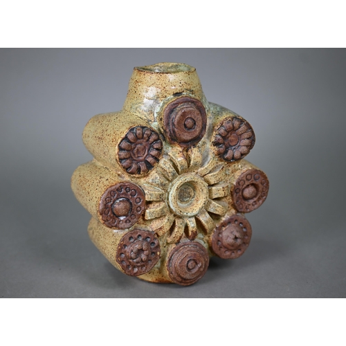 659 - Bernard Rooke (b 1938) - An abstract design stoneware wheel-vase with roundels, 19.5 cm highARR may ... 