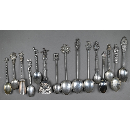 66 - Six silver coffee spoons with bean finials and various other silver spoons, tongs, napkin rings and ... 