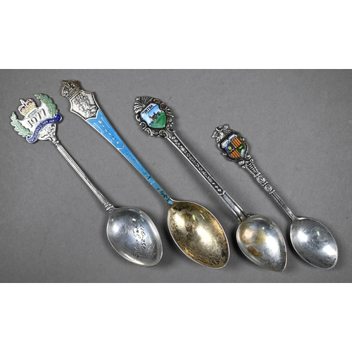 66 - Six silver coffee spoons with bean finials and various other silver spoons, tongs, napkin rings and ... 