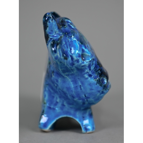 661 - A Bitossi Aldo Rimini blue/green glazed earthenware cow with impressed decoration, 9 x 16 cm