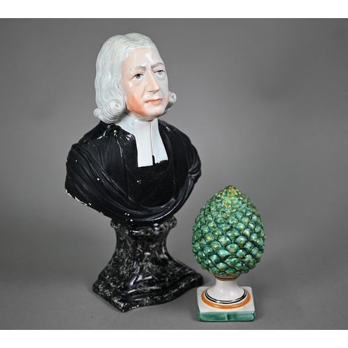 662 - A Staffordshire pearlware bust in the manner of Enoch Wood - The Revd John Wesley, on marbled socle,... 