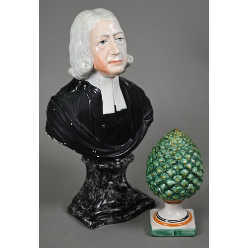 662 - A Staffordshire pearlware bust in the manner of Enoch Wood - The Revd John Wesley, on marbled socle,... 