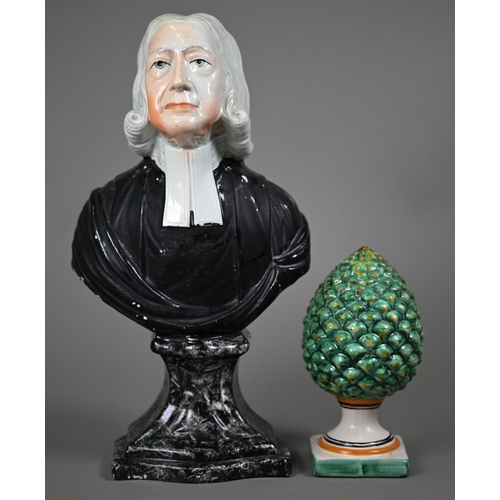 662 - A Staffordshire pearlware bust in the manner of Enoch Wood - The Revd John Wesley, on marbled socle,... 