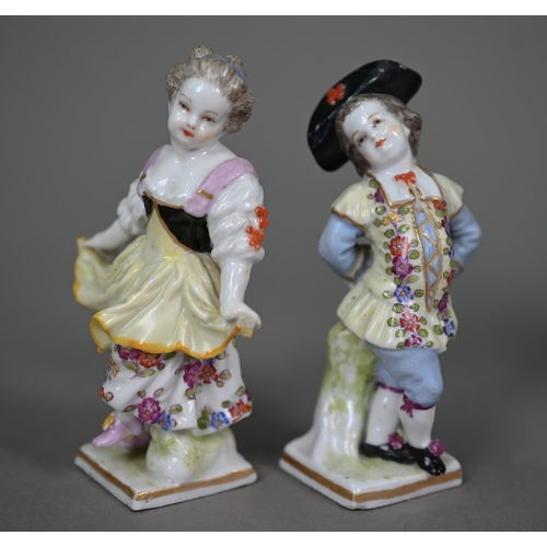 663 - Two antique Continental porcelain figures of street-vendors, to/w a pair of (probably) Samson of Par... 