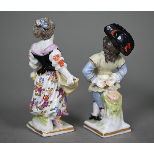 663 - Two antique Continental porcelain figures of street-vendors, to/w a pair of (probably) Samson of Par... 