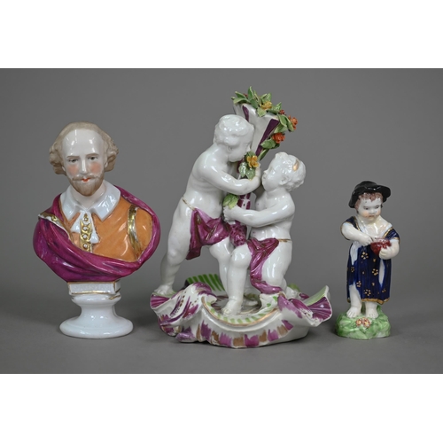 666 - An 18th century Vienna porcelain group, two putti squabbling over a floral cornucopia, on scrolling ... 