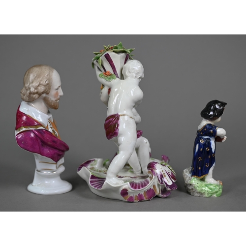 666 - An 18th century Vienna porcelain group, two putti squabbling over a floral cornucopia, on scrolling ... 