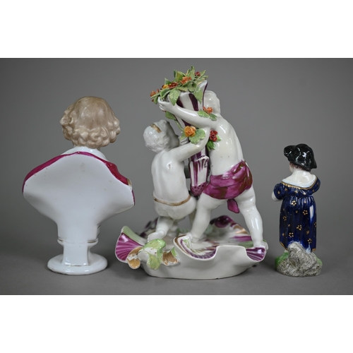 666 - An 18th century Vienna porcelain group, two putti squabbling over a floral cornucopia, on scrolling ... 