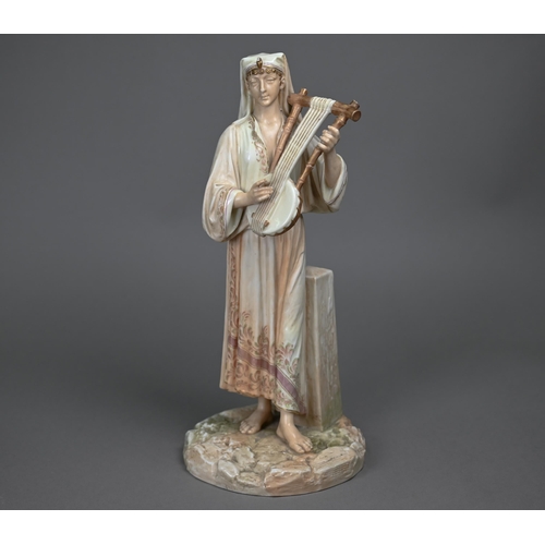 670 - A Victorian Royal Worcester china figure, Egyptian musician, date mark for 1886, 32 cm 