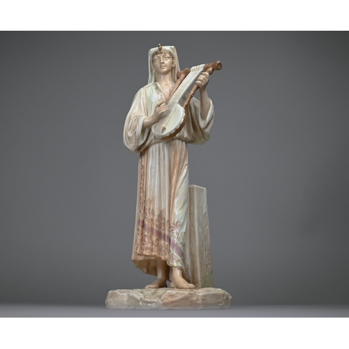 670 - A Victorian Royal Worcester china figure, Egyptian musician, date mark for 1886, 32 cm 