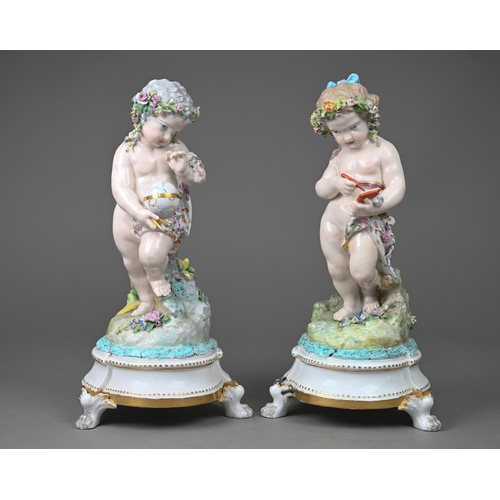 673 - A pair of Fontainbleu porcelain Allegorical figures of putti, symbolising Art and Education, 24 cm h... 