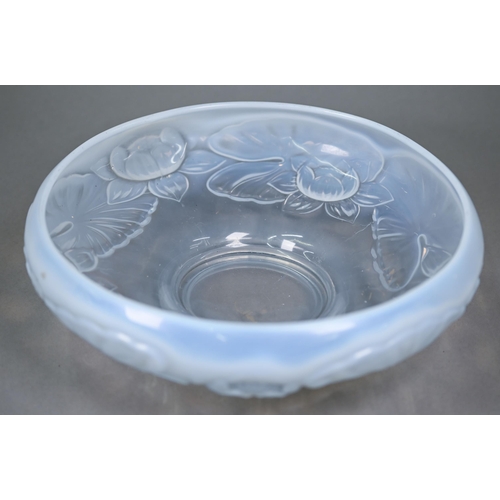 680 - A 1930s blue opalescent pressed glass bowl, moulded with waterlilies (unmarked) 28 cm diam