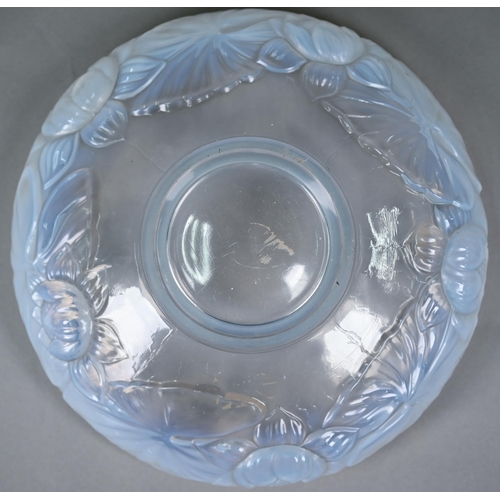 680 - A 1930s blue opalescent pressed glass bowl, moulded with waterlilies (unmarked) 28 cm diam