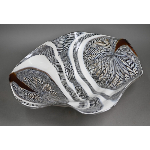 680A - A Luca Vidal Murano bowl with elongated outsize cane swirling designs, 53 x 44cm