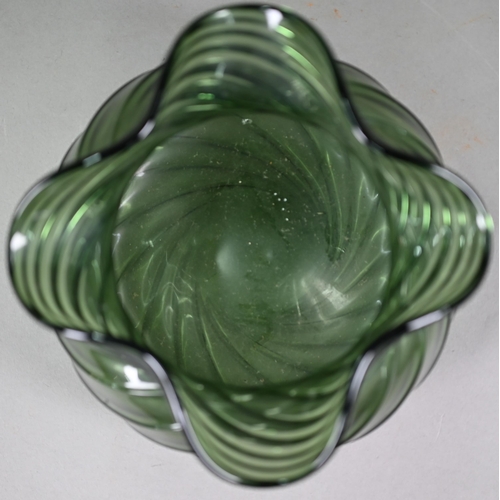 685 - A green glass pouch-vase with spiral-fluted decoration and quatrefoil-pinched rim, 17cm high to/w an... 