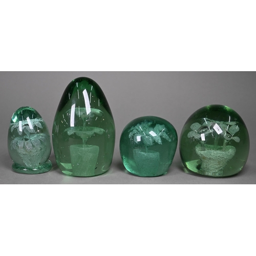 686 - Four Stourbridge green glass 'dumps' with internal floral designs to/w three dumps with bubbles, 12.... 