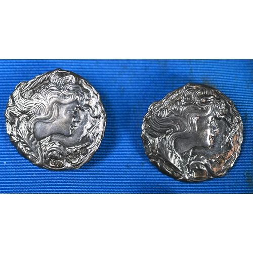 69 - A set of six Art Nouveau silver buttons decorated with female profiles, Robert Pringle & Sons, C... 