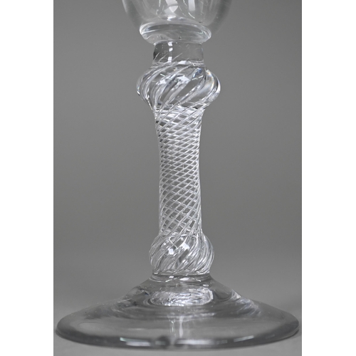 691 - A Georgian cordial glass with campana bowl on air-twist baluster stem and domed foot, 16.5 cm high (... 