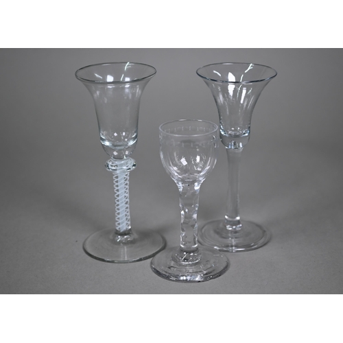 692 - A Georgian cordial glass with campana bowl on opaque twist baluster stem, 16 cm high to/w a plain gl... 