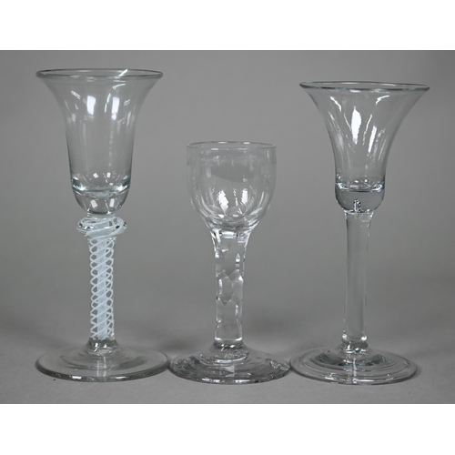 692 - A Georgian cordial glass with campana bowl on opaque twist baluster stem, 16 cm high to/w a plain gl... 