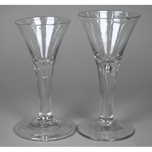 697 - A Georgian drinking glass with conical bowl on airtwist stem and domed foot, 12.5 cm to/w two glasse... 