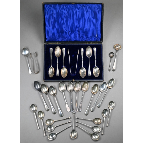 73 - An Edwardian cased set of six coffee spoons and tongs with shell bowls, London 1903, to/w eleven sea... 