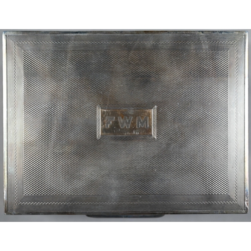 76 - A late Victorian engraved silver cigarette case, Birmingham 1897, to/w an engine-turned cigarette bo... 