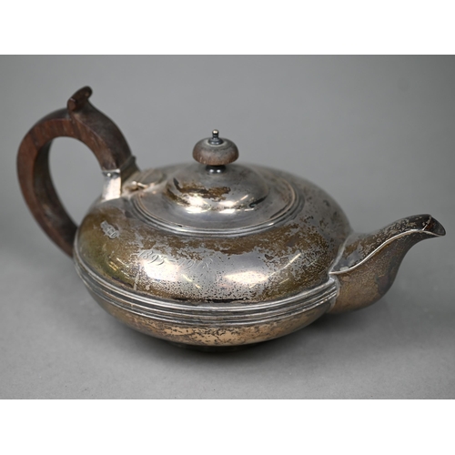 83 - A silver teapot of compressed melon form with rosewood handle and finial,  Fordham & Fordham, Sh... 