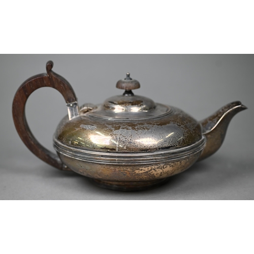 83 - A silver teapot of compressed melon form with rosewood handle and finial,  Fordham & Fordham, Sh... 