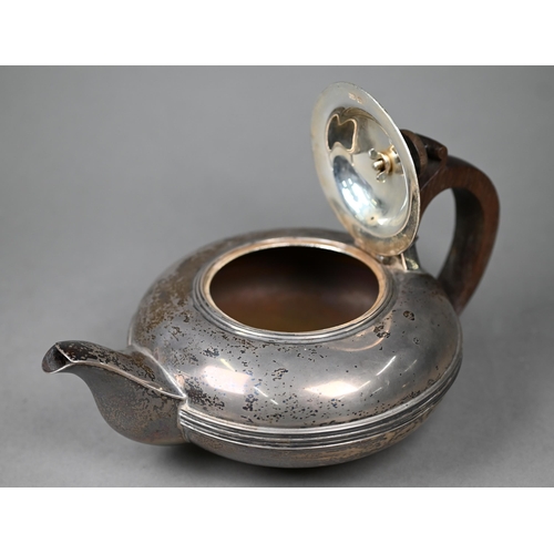 83 - A silver teapot of compressed melon form with rosewood handle and finial,  Fordham & Fordham, Sh... 