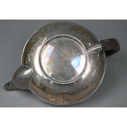 83 - A silver teapot of compressed melon form with rosewood handle and finial,  Fordham & Fordham, Sh... 