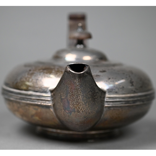 83 - A silver teapot of compressed melon form with rosewood handle and finial,  Fordham & Fordham, Sh... 