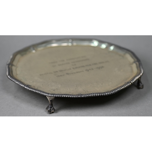 93 - A silver letter salver with gadrooned rim and claw and ball feet, Garrard & Co, Sheffield 1954, ... 