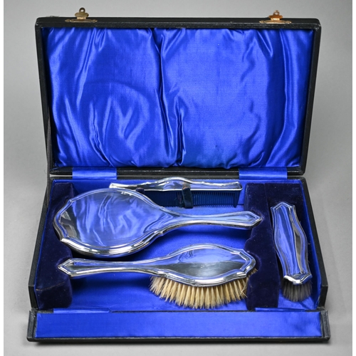 96 - A cased silver four-piece brush set, Charles S. Green & Co. Ltd, London 1915-17 (little used)