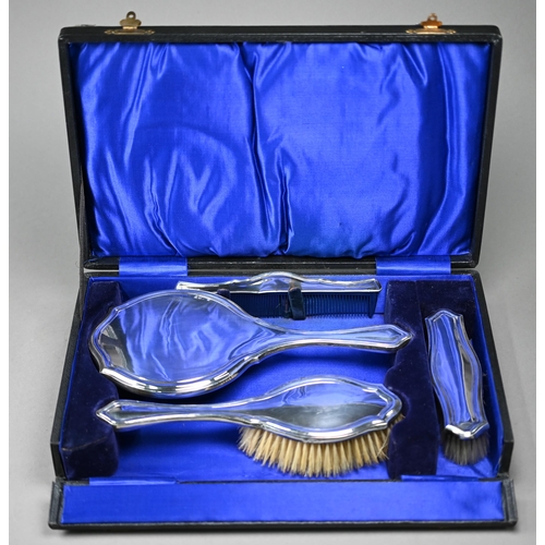 96 - A cased silver four-piece brush set, Charles S. Green & Co. Ltd, London 1915-17 (little used)