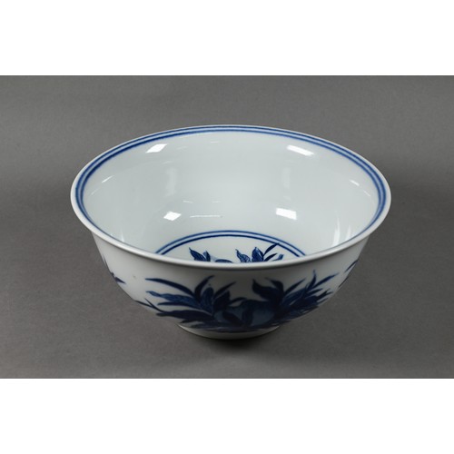 584 - A Chinese blue and white bowl painted with fruiting pomegranate sprays, the base with six-character ... 