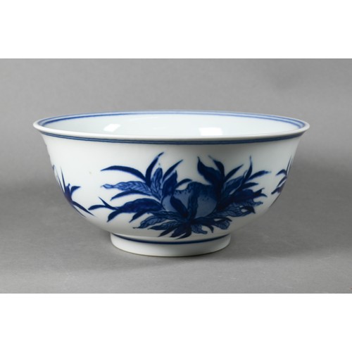 584 - A Chinese blue and white bowl painted with fruiting pomegranate sprays, the base with six-character ... 