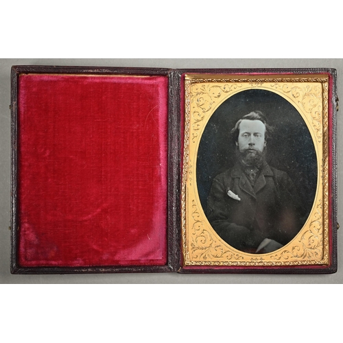 1021 - Four Ambrotype photographic portraits of ladies and a gentleman, in gilt mounts and leather pocket-c... 