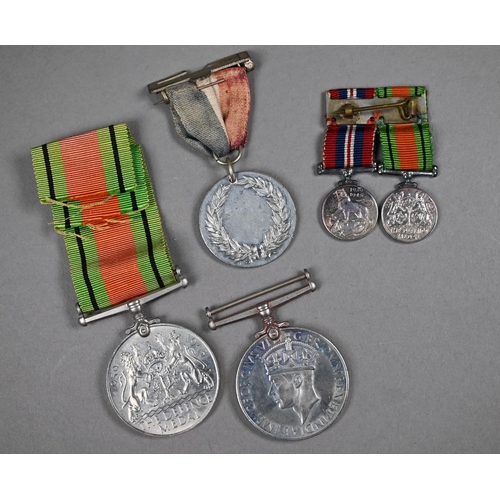 1030 - A group of 5 WWII period medals - 1939-45 Star; Africa Star; 1939 War Medal; Defence Medal; Efficien... 