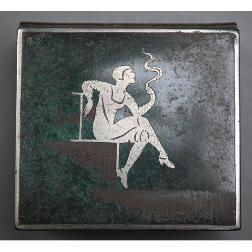 1085 - WMF, Germany - a 1930s cigarette box with fired patination finish featuring silhouette of lady smoki... 