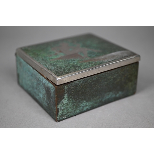 1085 - WMF, Germany - a 1930s cigarette box with fired patination finish featuring silhouette of lady smoki... 