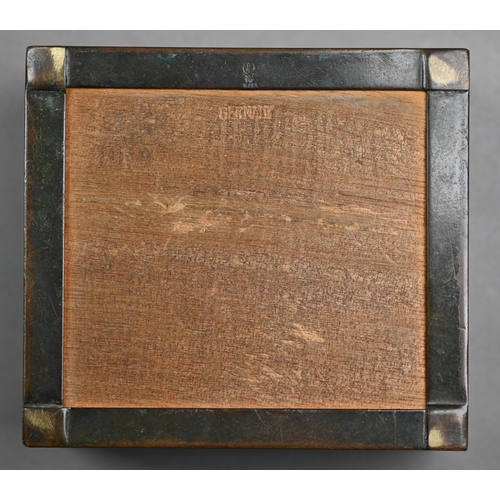 1085 - WMF, Germany - a 1930s cigarette box with fired patination finish featuring silhouette of lady smoki... 