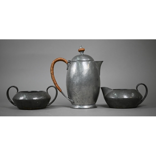 1090 - A Liberty & Co planished pewter ovoid coffee pot/hot water jug with wicker-bound handle, no 0145... 