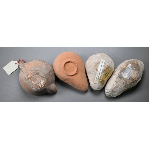 1094 - Three antiquity terracotta oil lamps to/w a later example and a reproduction metal lamp (5)