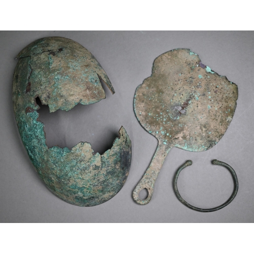 1098 - An antiquity copper oval bowl, 9 x 11 cm and a hand-mirror (a/f) to/w a torque bracelet, four bodkin... 