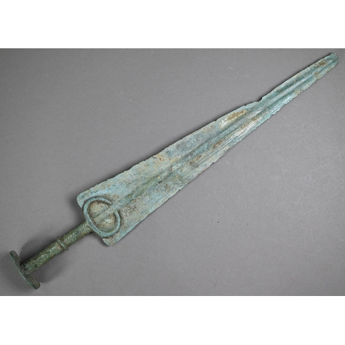 1101 - A Bronze Age short sword (possibly Marlik), the tapering blade with raised midrib, penannular guard ... 