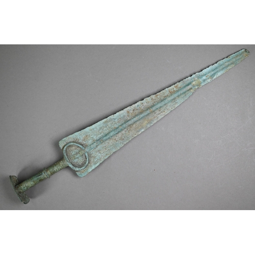 1101 - A Bronze Age short sword (possibly Marlik), the tapering blade with raised midrib, penannular guard ... 